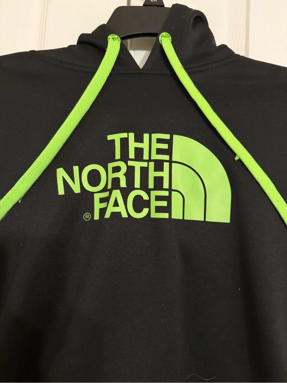The North Face Black Pullover Hoodie with Neon Green Logo